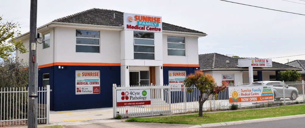 Sunrise Family Medical Centre building and NOW OPEN banner, Werribee