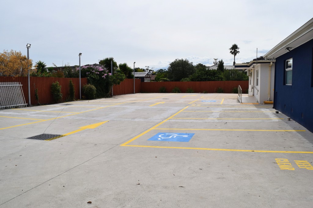 Examination room with privacy curtain at Sunrise Family Medical Centre